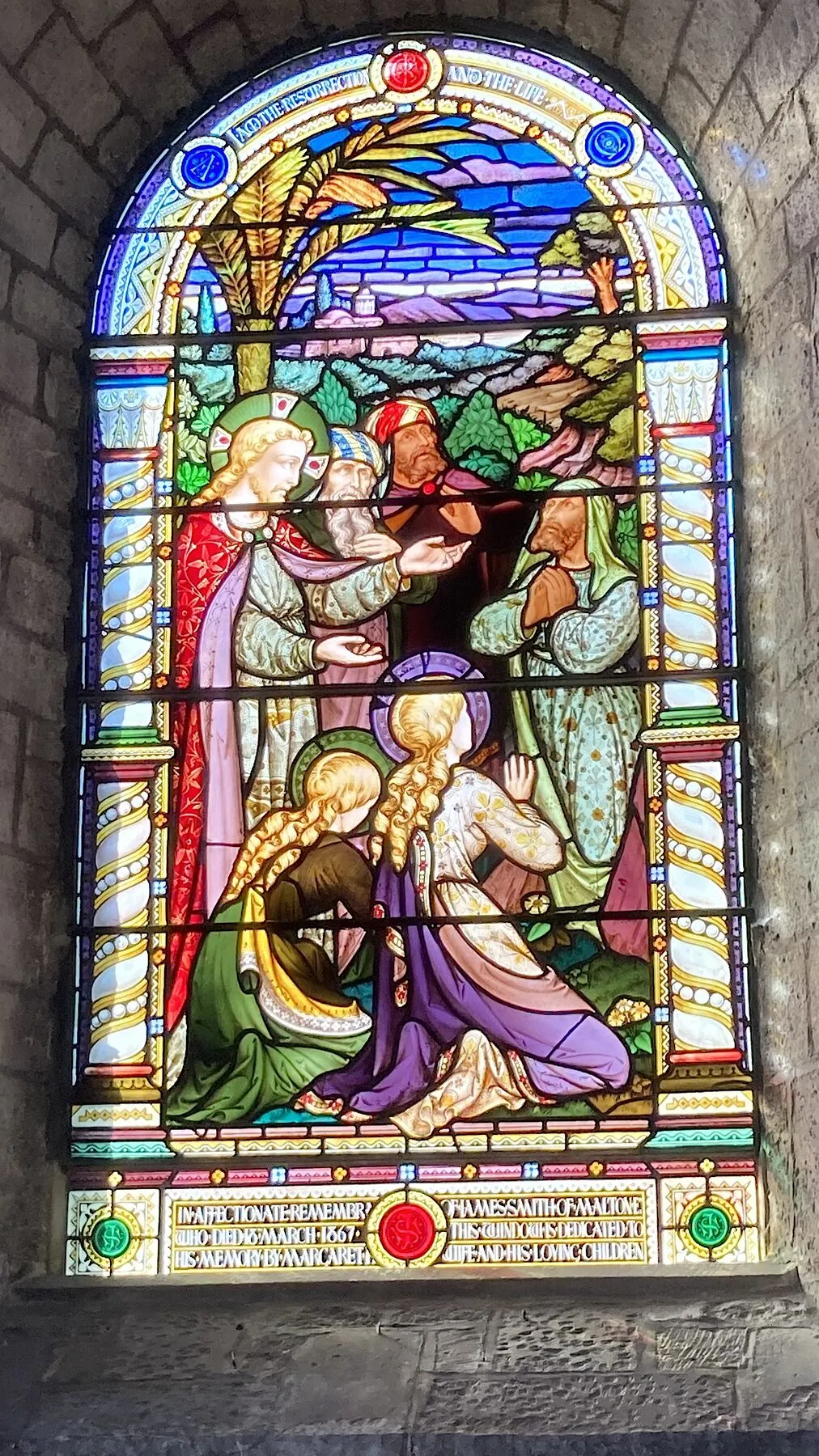 Close view of the coloured glass figures